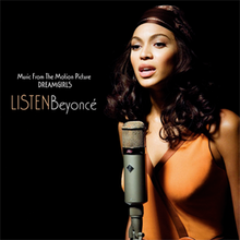 A woman is standing against a dark background. She wears a blouse and a headband while she sings with a microphone she has in front of her. The words "Music from the Motion Picture", "Dreamgirls", "Listen" and "Beyoncé" are written next to her image.