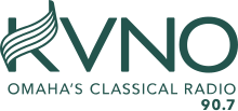 All in a dark green: The letters KVNO in a sans serif on top, with the upward stroke of the K changed to a curling music staff. Beneath are the words "Omaha Classical Radio" and "90.7".