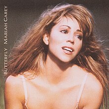 CD single cover of "Butterfly" showing Mariah Carey from the chest upwards looking to the right with her eyes and mouth open