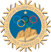 A stylized snowflake with the Olympic rings, a star and mountains. Surrounding the perimeter of the snowflake are the words, "VII Giochi Olimpici d'Inverno, Cortina d'Ampezzo 1956"