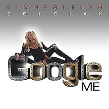 Over a gray-to-white gradient background, a picture of American television personality Kim Zolciak appears, laying atop the words "Google Me"; her name appears above