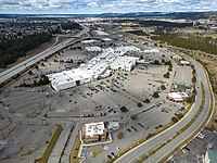 Aerial view of the mall and surrounding skyline taken during the spring as the sun was overhead on a partly cloudy day