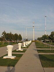 Middle Harbor Shoreline Park, with the mast of USS Oakland in the distance.