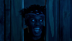 KSI imitating Jack Torrance from The Shinning in the music video for "On Point".