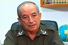 Man in a military uniform sitting