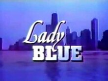 A cityscape, with the title "Lady Blue" superimposed on it