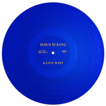 A blue LP vinyl with yellow lettering of the "Jesus Is King" album.