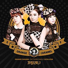 Three women wearing black and white polka-dotted dress, hats and gloves are posing against an orange circle placed over a black background. The words "Orange Caramel" are written below in caps.