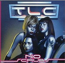 The TLC members are posing in metallic skin in front of a blue and yellow background.