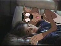 MC Skat Kat with Paula Abdul in the 1989 music video "Opposites Attract"