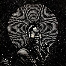 A drawing of a nude Black person with pitch black skin that resembles rubber, posed in front of a series of white concentric circles over a white-specked black background.