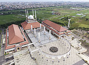 The Grand Mosque of the Masjid Agung in Central Java, Indonesia, features a multi-layered roof typical of Indonesian mosque architecture.