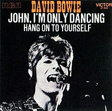 A black-and-white photo of a man singing into a microphone. The words "David Bowie", "John, I'm Only Dancing" and "Hang On to Yourself" appear at the top.