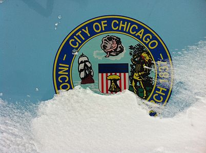 The Seal of the City of Chicago on a stranded salt truck on Lakeshore drive during the storm.