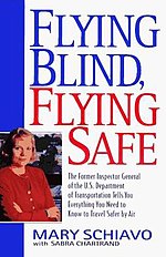 Cover has a small head and shoulders photo of the author, a short-haired blond woman with arms folded.