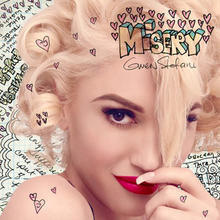 Stefani is shown with her left hand touching her mouth and tugging on her bangs; the background consists of the song's handwritten lyrics while the song's title is surrounded by hearts and appears in the upper right hand corner