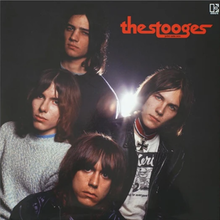 2020 reissue album cover showing the faces of the four group members