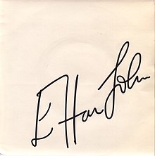 white (fading?) sleeve with Elton John's signature