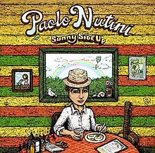 Sunny Side Up Album Cover - drawing of a man eating breakfast in a brightly coloured room.