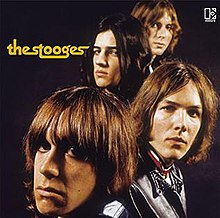 Album cover showing the faces of the four group members