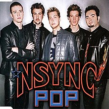NSYNC posing in front of a gray background and a . The group's name and song title are positioned in front of them.