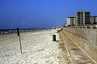 Seawall on North Padre Island constructed in the backbeach to protect condominiums from storm waves and beach erosion. Central Texas