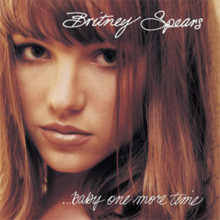 The picture of a female who looks the camera. She has straight brown hair and wears minimal make-up. At top the image, the words "Britney Spears" are written in white cursive letters, while at the bottom "...baby one more time".