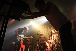 The Wombats performing in September 2012; from left to right: Matthew Murphy, Dan Haggis, and Tord Øverland Knudsen