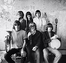 Jefferson Airplane in front of an interior wall at The Matrix