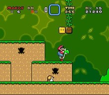 This screenshot shows Mario riding Yoshi during the first level of the game. The scenery shows a jungle environment with floating blocks scattered in the air. The interface displayed around the corners shows the number of lives the player has, the Dragon Coins collected, the player's stored power-up, the level's remaining time, the player's number of coins, and the total score of the player.