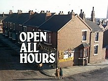 1976 title card. The series title appears over an aerial shot of the corner shop.