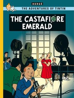 Tintin is looking at us, signalling us to stay quiet, as Castafiore is being filmed for television in the background while at Marlinspike Hall.