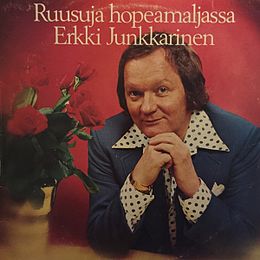 Studioalbumin Ruusuja hopeamaljassa kansikuva