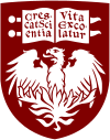 The seal of the University of Chicago. It is in the shape of a shield, with a drawing of a phoenix on the bottom and a book with the University's motto "Crescat scientia; vita excolatur" on the top.