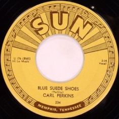 Обложка сингла Карла Перкинса «Blue Suede Shoes» (1956)