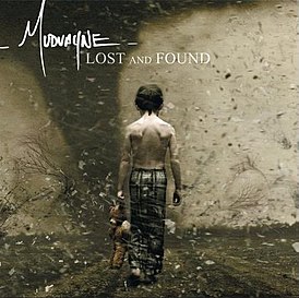 Обложка альбома Mudvayne «Lost and Found» (2005)