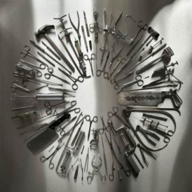 Обложка альбома Carcass «Surgical Steel» (2013)