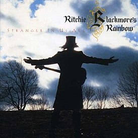 Обложка альбома Rainbow «Strangers in Us All» (1995)