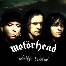 Обложка альбома Motörhead «Overnight Sensation» (1996)