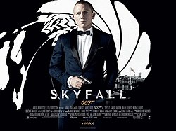 The poster shows a man wearing a tuxedo and holding a gun, standing in front of an image that looks like it was taken from the inside of a gun barrel, with the London skyline visible behind him. Text at the bottom of the poster reveals the film title and credits.