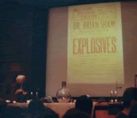 Rare image of Dr Brian Duncan Shaw giving a practical demonstration of explosive chemistry at the age of 88.[22]