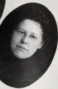 Winnifred Wygal, a young white woman wearing glasses, in an oval frame