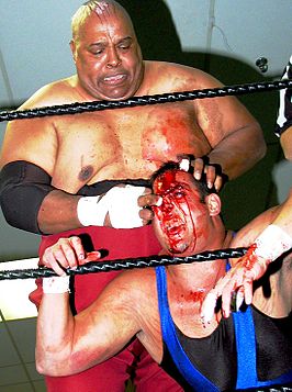 Als Abdullah the Butcher (boven) in 2004