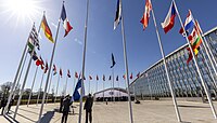 The flag of Finland is raised at NATO headquarters in Brussels on 4 April 2023.