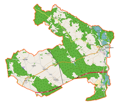 Mapa konturowa gminy Trzciel, blisko prawej krawiędzi na dole znajduje się owalna plamka nieco zaostrzona i wystająca na lewo w swoim dolnym rogu z opisem „Lutol”