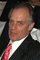 Keith Carradine interpreta Conrad Dalton