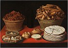 Bodegón mit Waffeln, Nougat und Gebäck und einem Korb mit Haselnüssen und Maroni, um 1635 (?), Öl auf Leinwand, 66 × 95 cm, Prado, Madrid