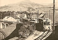 Züge der ASt und der 1912 eröffneten Säntisbahn (SB) bei der Einfahrt in den Bahnhof Appenzell