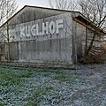 Schriftzug an der Straße Kuglhof