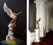 Sculpture of a winged nude in a museum